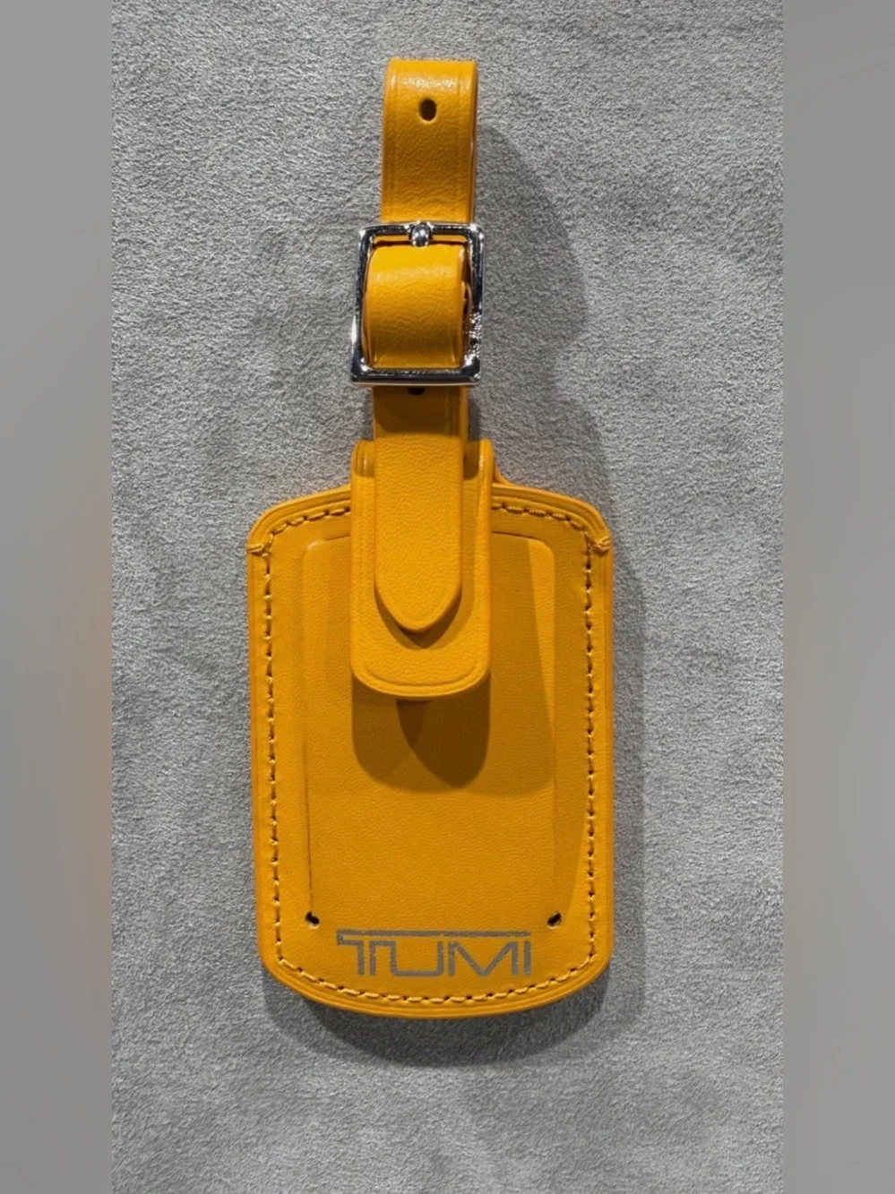 NEW IN BOX - Tumi 3.625” x 2.25” Leather Luggage Name Tag w/ Buckle - ORANGE